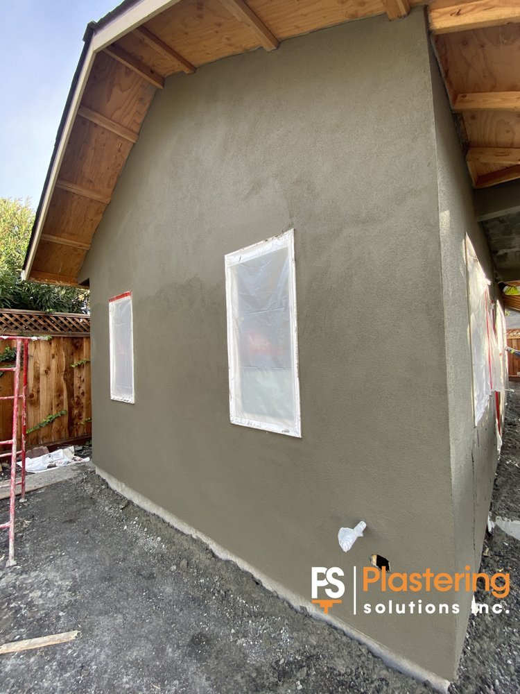 Brown coat applied to the gable wall with windows masked