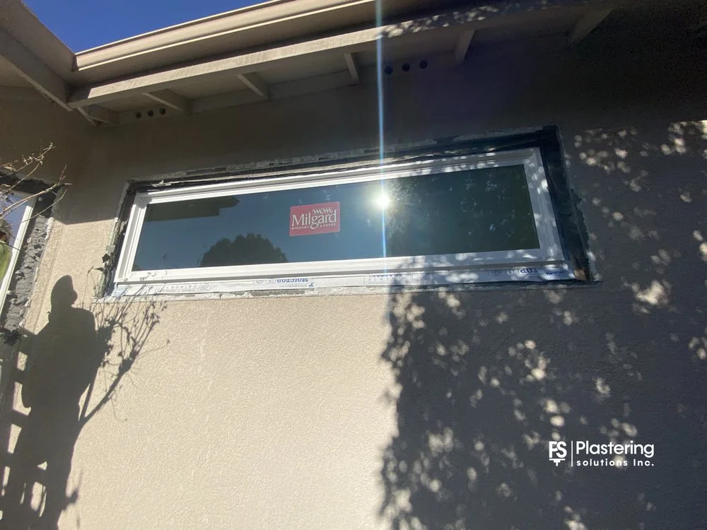 New wide window with flashing tape before the stucco patch