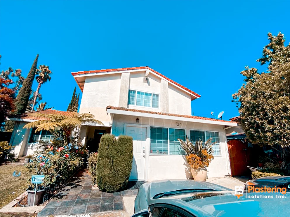 Front of the finished San Jose home with a smooth acrylic stucco exterior