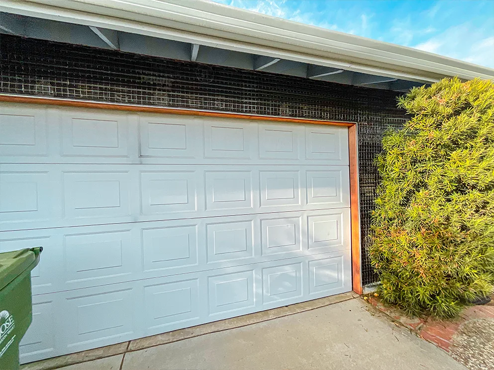 Metal lath installed above the garage door