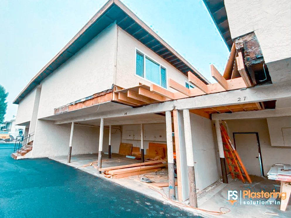 Rebuilt carport framing at the apartment complex