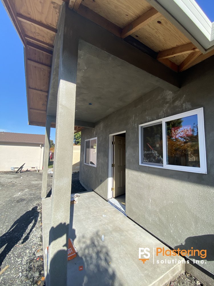 Finished stucco on the covered patio column and entry wall