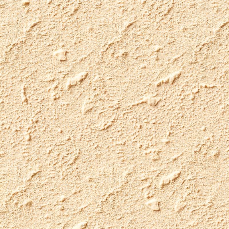 Close view of a lace stucco finish showing flat knocked down islands between the texture