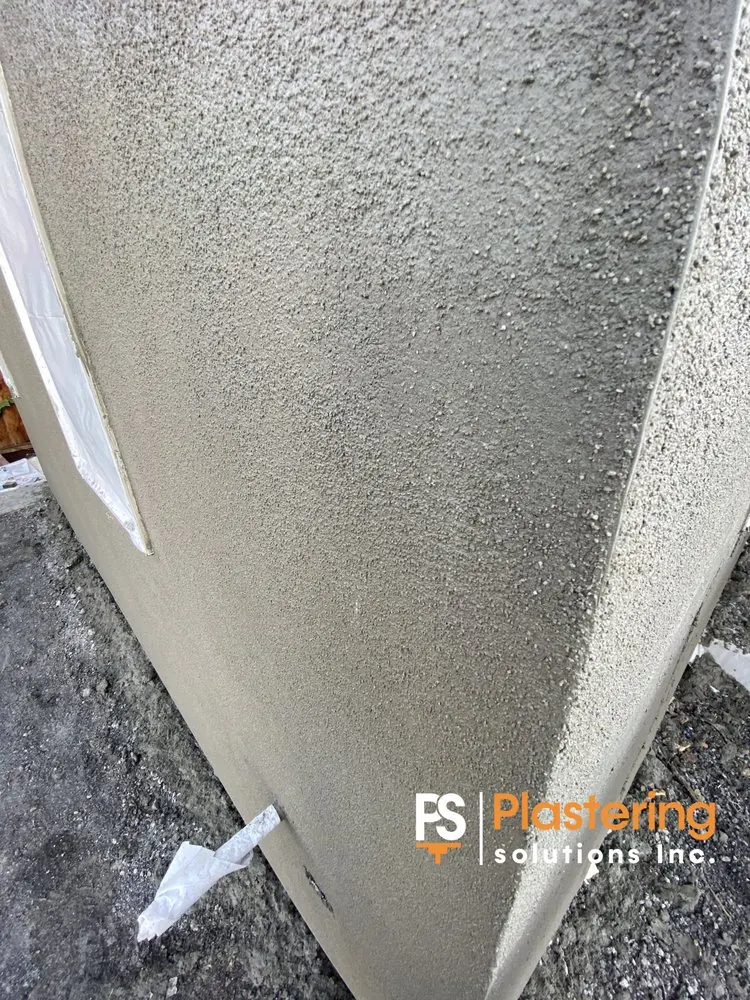 Close view of textured stucco at an outside corner